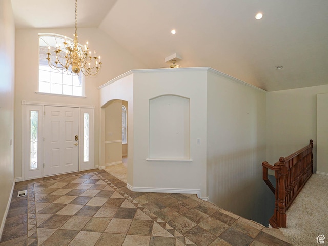 1539 S 50 E, Salem, UT 84653 - foyer entrance with a chandelier, stone tile flooring, high vaulted ceiling, plenty of natural light, and recessed lighting