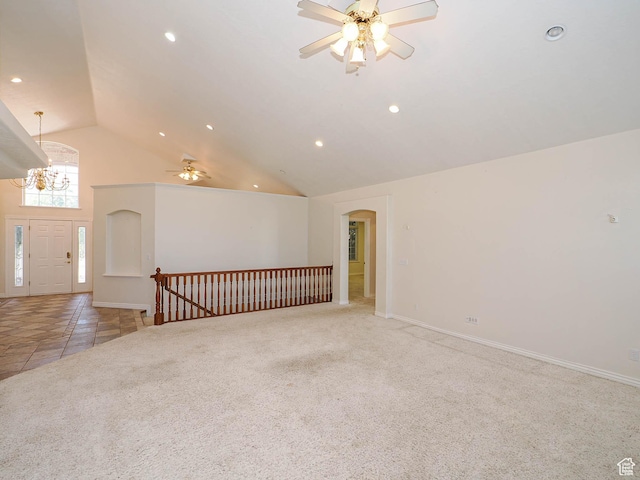 1539 S 50 E, Salem, UT 84653 - spare room with arched walkways, ceiling fan, high vaulted ceiling, light carpet, and a chandelier