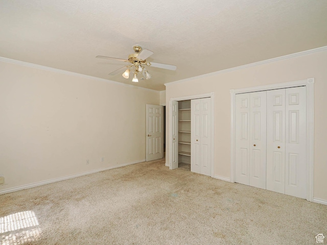 1539 S 50 E, Salem, UT 84653 - unfurnished bedroom with ornamental molding, carpet floors, two closets, and a ceiling fan