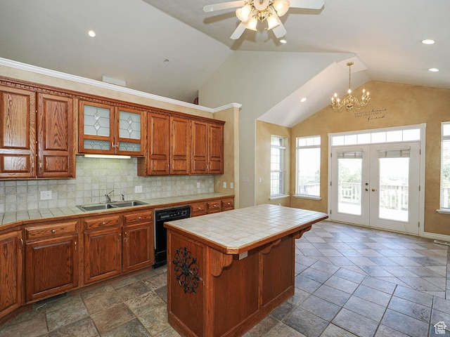 1539 S 50 E, Salem, UT 84653 - kitchen with dishwasher, tile countertops, vaulted ceiling, french doors, and tasteful backsplash