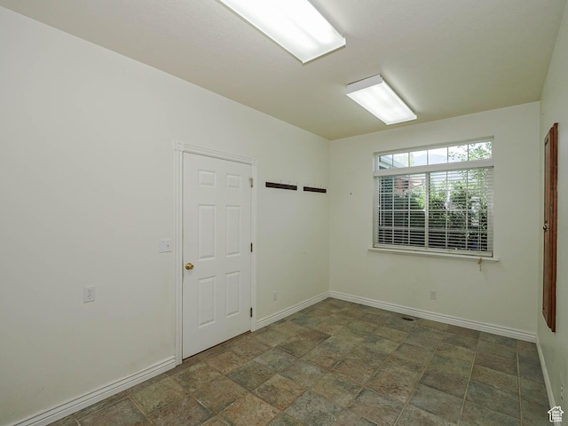 1539 S 50 E, Salem, UT 84653 - spare room featuring baseboards and stone finish floors