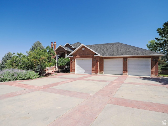 1539 S 50 E, Salem, UT 84653 - view of front of home featuring brick siding, concrete driveway, a shingled roof, and an attached garage