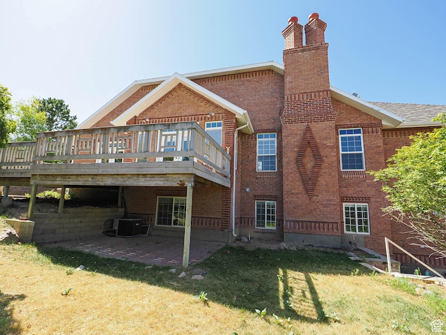 1539 S 50 E, Salem, UT 84653 - back of house with brick siding, a lawn, a chimney, and a wooden deck