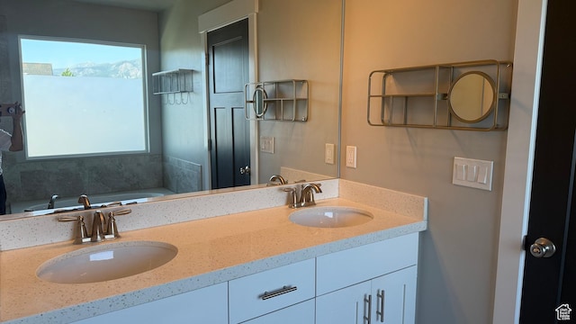 559 E Petersen Pkwy, South Weber, UT 84405 - full bathroom featuring double vanity and a bath