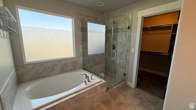 559 E Petersen Pkwy, South Weber, UT 84405 - bathroom with a bath, a stall shower, and a spacious closet