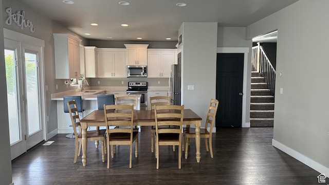 559 E Petersen Pkwy, South Weber, UT 84405 - dining area featuring dark wood finished floors, stairs, and recessed lighting