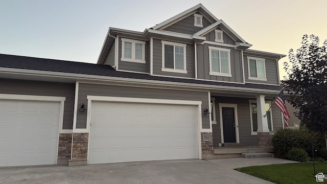 559 E Petersen Pkwy, South Weber, UT 84405 - craftsman-style home featuring stone siding, board and batten siding, and concrete driveway
