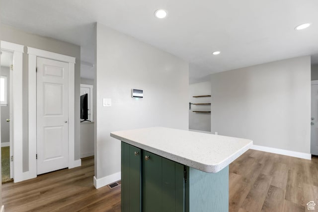 271 S Barratt Cir, American Fork, UT 84003 - kitchen featuring green cabinets, dark wood-style floors, a center island, light countertops, and recessed lighting