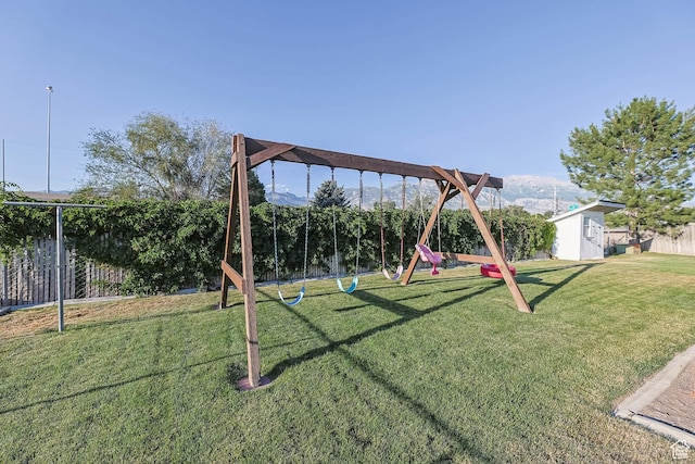 271 S Barratt Cir, American Fork, UT 84003 - view of yard with a playground, a mountain view, and an outbuilding
