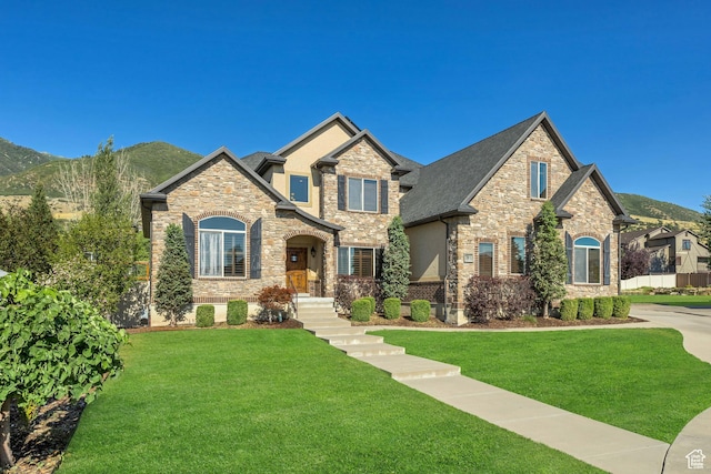 789 Eliza Ct, Farmington, UT 84025 - craftsman-style home featuring stone siding, a front lawn, stucco siding, and a mountain view