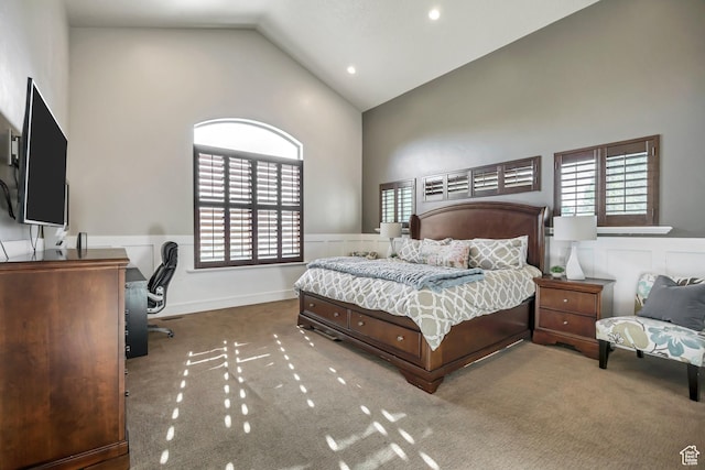 789 Eliza Ct, Farmington, UT 84025 - bedroom with high vaulted ceiling, wainscoting, an office area, carpet flooring, and multiple windows
