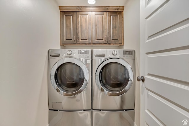 789 Eliza Ct, Farmington, UT 84025 - washroom featuring cabinet space and washing machine and clothes dryer