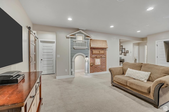 789 Eliza Ct, Farmington, UT 84025 - living area featuring a barn door, light carpet, recessed lighting, and arched walkways