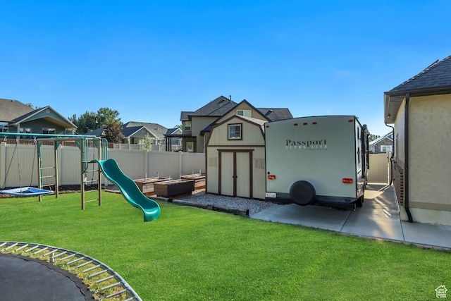 789 Eliza Ct, Farmington, UT 84025 - view of play area with a fenced backyard, an outbuilding, and a residential view