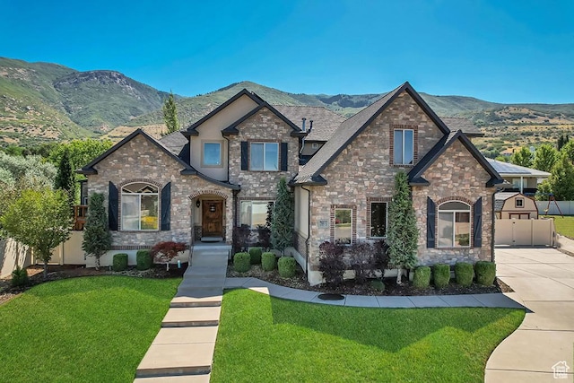 789 Eliza Ct, Farmington, UT 84025 - view of front of property with stone siding and a mountain view