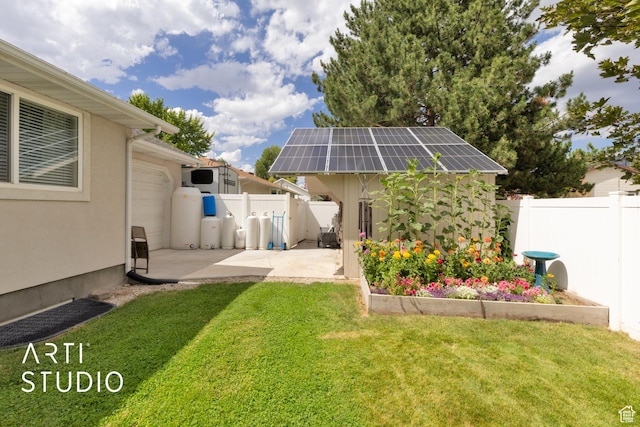 796 N 200 W, American Fork, UT 84003 - fenced backyard with a patio, an outbuilding, and a garage