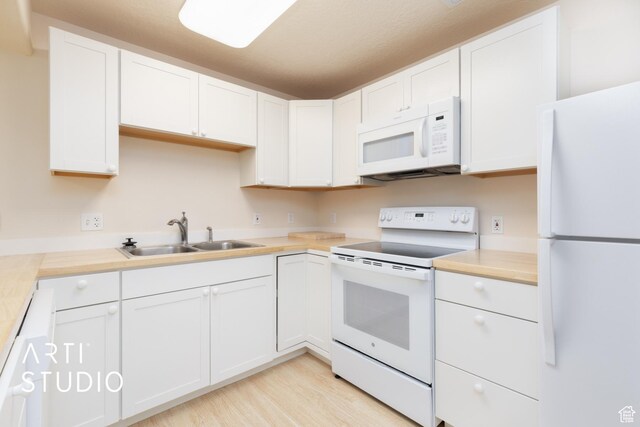 796 N 200 W, American Fork, UT 84003 - kitchen featuring white appliances, light countertops, white cabinets, and light wood finished floors