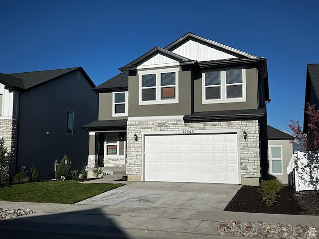 12343 S Varitek Dr, Herriman, UT 84096 - craftsman house with driveway, stone siding, stucco siding, and a garage