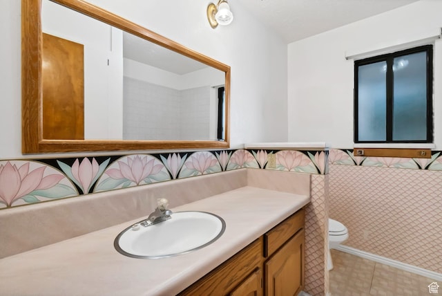 458 E 200 S, Annabella, UT 84711 - bathroom with vanity, wainscoting, tile patterned floors, and tile walls