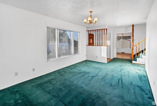 458 E 200 S, Annabella, UT 84711 - carpeted empty room with a chandelier, stairway, and a textured ceiling