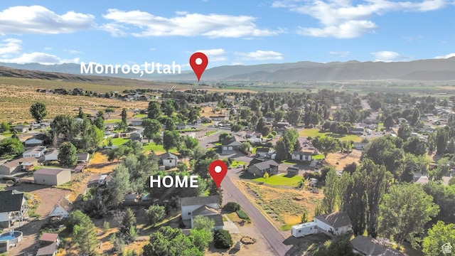 458 E 200 S, Annabella, UT 84711 - aerial view of property and surrounding area with mountains and nearby suburban area