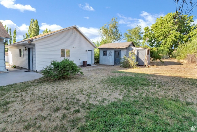458 E 200 S, Annabella, UT 84711 - rear view of house featuring a shed and a yard