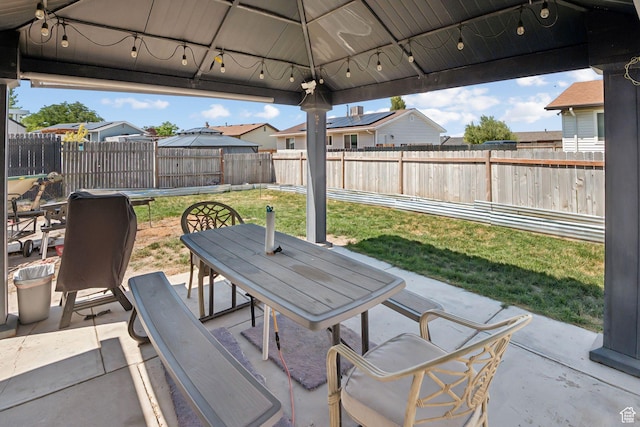 4807 S Heath Ave W, Salt Lake City, UT 84118 - fenced backyard with outdoor dining area, a patio area, and a residential view