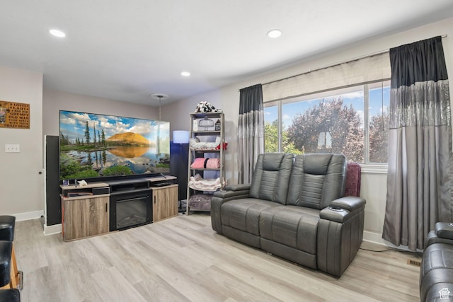 4807 S Heath Ave W, Salt Lake City, UT 84118 - living room with light wood-style floors and recessed lighting