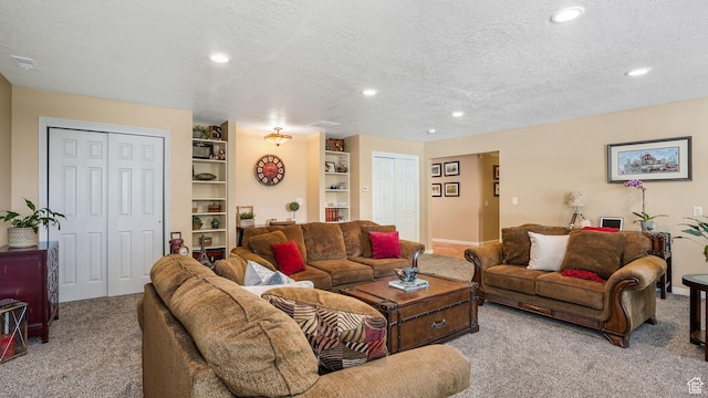 2275 E 9800 S, Sandy, UT 84092 - carpeted living room with a textured ceiling, recessed lighting, and built in shelves