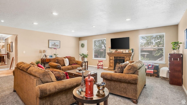2275 E 9800 S, Sandy, UT 84092 - living area featuring light carpet, a textured ceiling, plenty of natural light, recessed lighting, and a fireplace