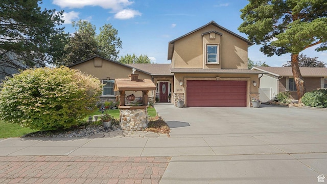 2275 E 9800 S, Sandy, UT 84092 - view of front of home with stucco siding, driveway, and stone siding