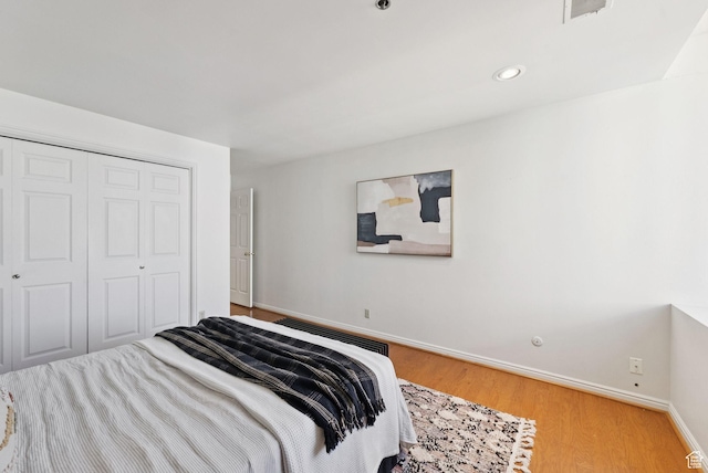 48 W 300 S Unit 1405N, Salt Lake City, UT 84101 - bedroom featuring light wood-style flooring, a closet, and recessed lighting