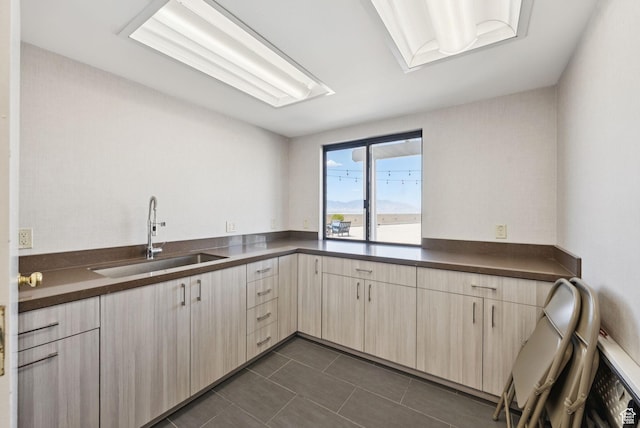 48 W 300 S Unit 1405N, Salt Lake City, UT 84101 - kitchen with dark countertops and dark tile patterned floors