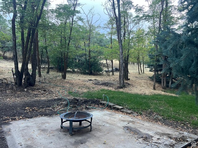 521 N Grove Dr, Alpine, UT 84004 - view of patio featuring a fire pit