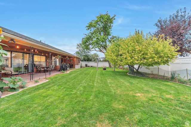 3161 S 8520 W, Magna, UT 84044 - fenced backyard with a patio area