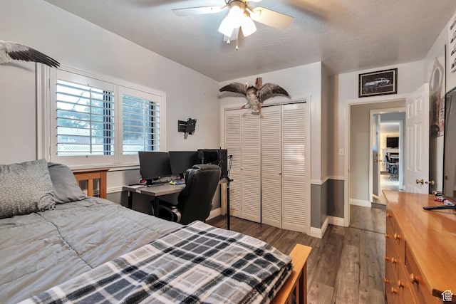 3161 S 8520 W, Magna, UT 84044 - bedroom featuring wood finished floors, a ceiling fan, and a closet