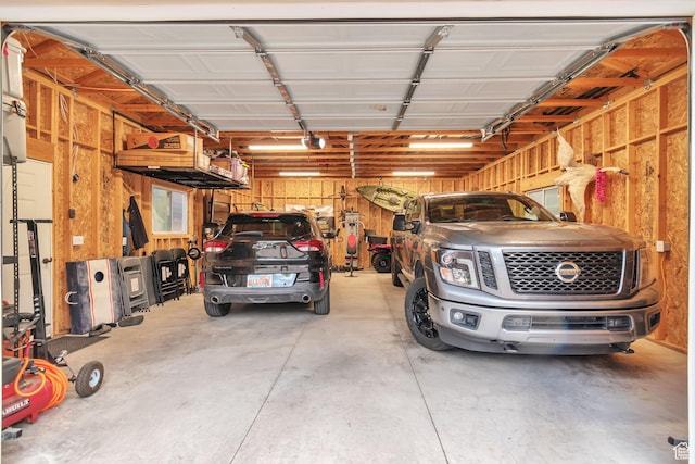 3161 S 8520 W, Magna, UT 84044 - garage featuring a garage door opener