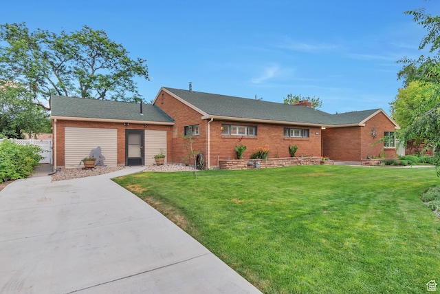 3161 S 8520 W, Magna, UT 84044 - ranch-style home with a front lawn and brick siding