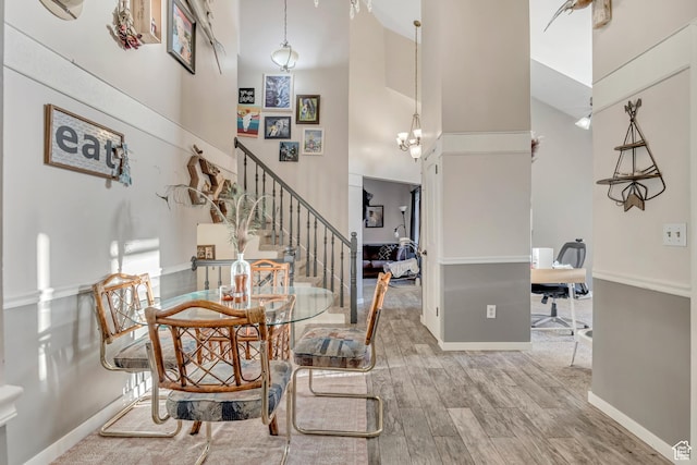 2115 W 1225 N, Layton, UT 84041 - dining room with a high ceiling, stairs, wood finished floors, and a desk