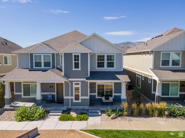 132 E Geyser Ct, Saratoga Springs, UT 84045 - craftsman-style home with covered porch, board and batten siding, and roof with shingles
