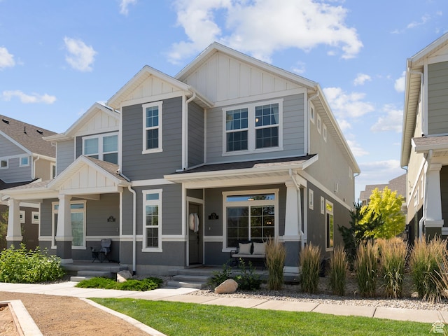 132 E Geyser Ct, Saratoga Springs, UT 84045 - craftsman-style house with a porch and board and batten siding