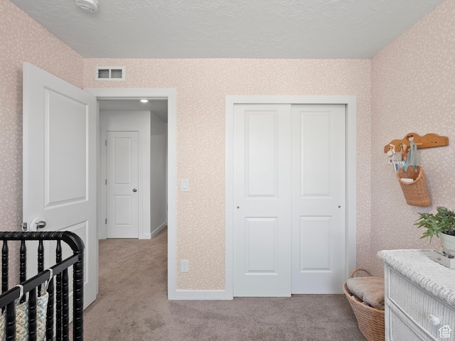 132 E Geyser Ct, Saratoga Springs, UT 84045 - carpeted bedroom with wallpapered walls and a closet