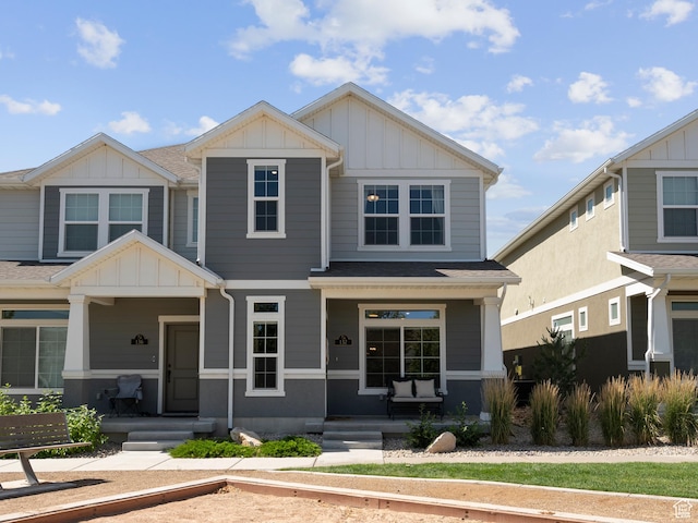 132 E Geyser Ct, Saratoga Springs, UT 84045 - view of front of house with a porch, board and batten siding, and a shingled roof