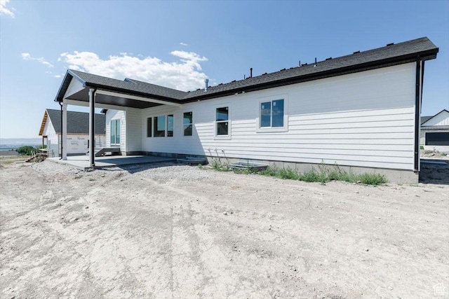 880 E 130 N, Hyde Park, UT 84318 - back of house with a patio area
