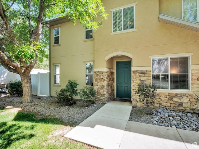 3908 W Lorient Ave, West Jordan, UT 84084 - view of front of house with stone siding and stucco siding