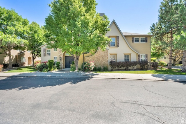 3908 W Lorient Ave, West Jordan, UT 84084 - view of front of property with stucco siding and stone siding