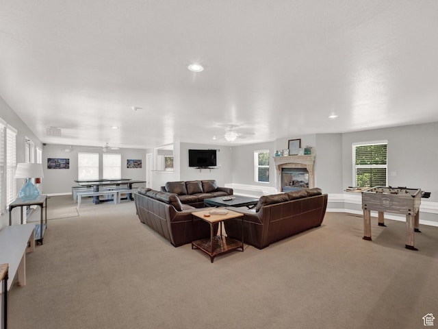 3908 W Lorient Ave, West Jordan, UT 84084 - carpeted living area with a ceiling fan, a fireplace, and recessed lighting