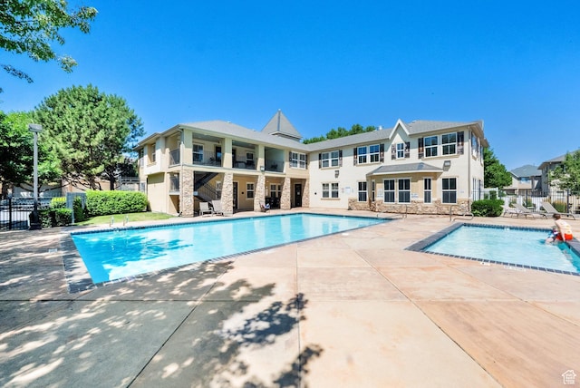 3908 W Lorient Ave, West Jordan, UT 84084 - community pool with a patio