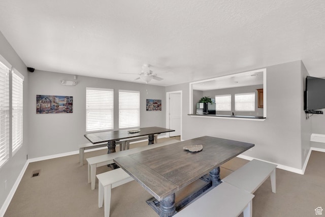 3908 W Lorient Ave, West Jordan, UT 84084 - dining area with carpet, ceiling fan, and healthy amount of natural light