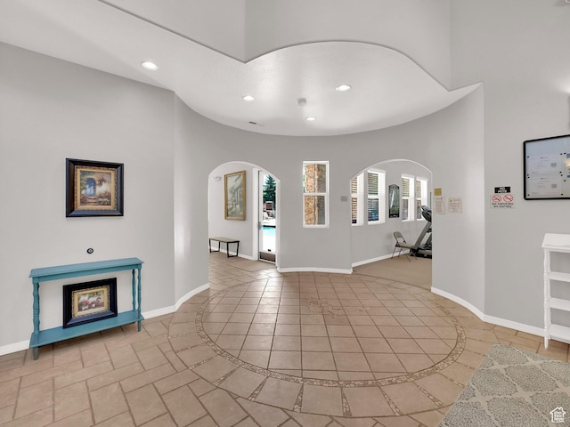3908 W Lorient Ave, West Jordan, UT 84084 - entryway featuring arched walkways, recessed lighting, and light tile patterned flooring